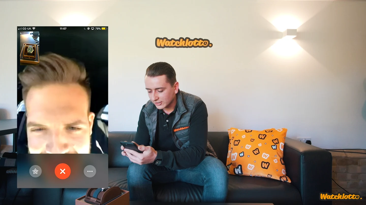 Harrison Gwinnett on the Watchlotto sofa speaking to a winner on a video call